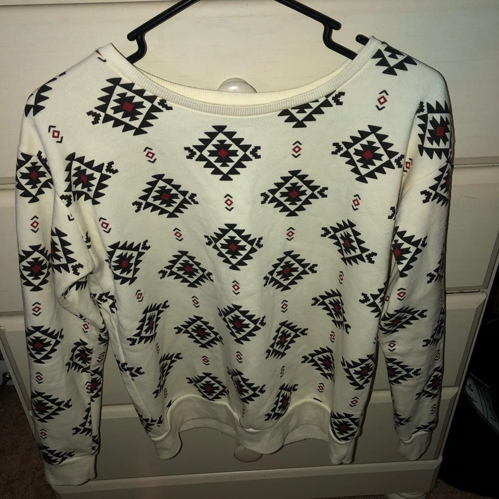 Cream, black, and maroon tribal print sweater
